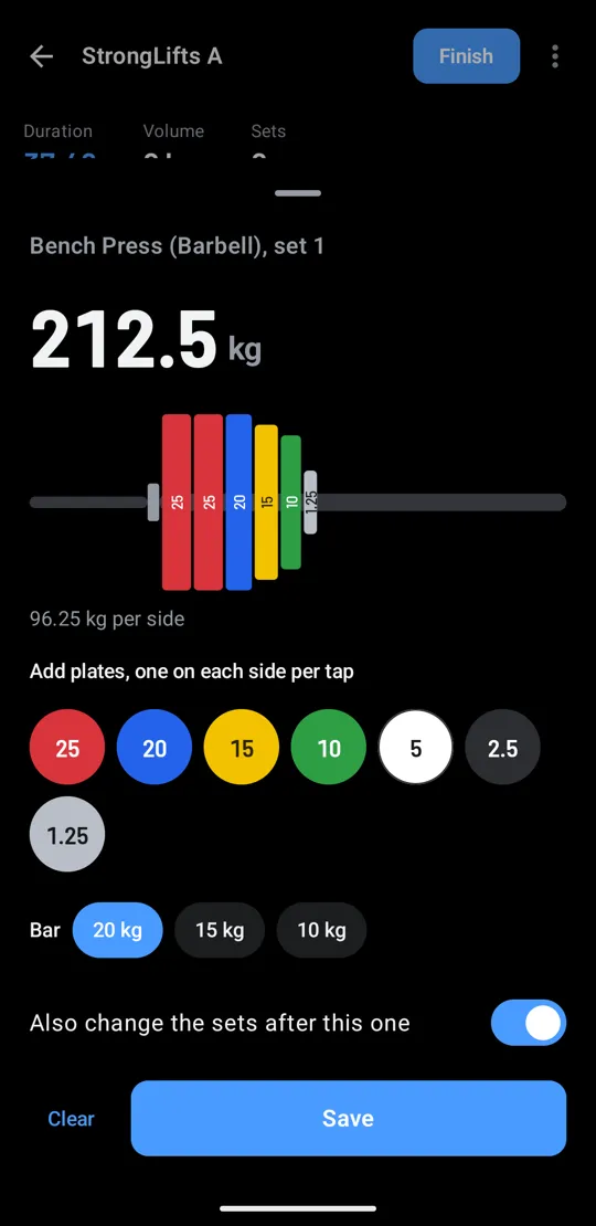 The weight sheet with 212.5 kg loaded as plates on a barbell